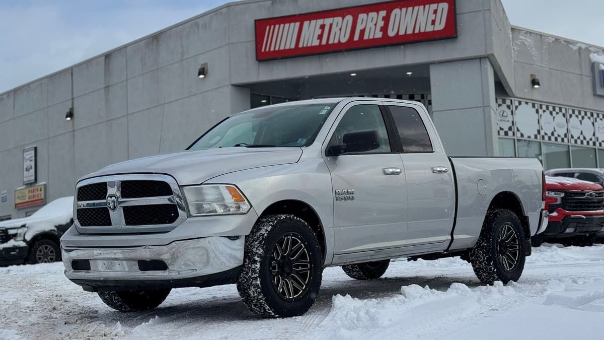 2015 Ram 1500 SLT 4WD Quad Cab 140.5" 5.7L V8